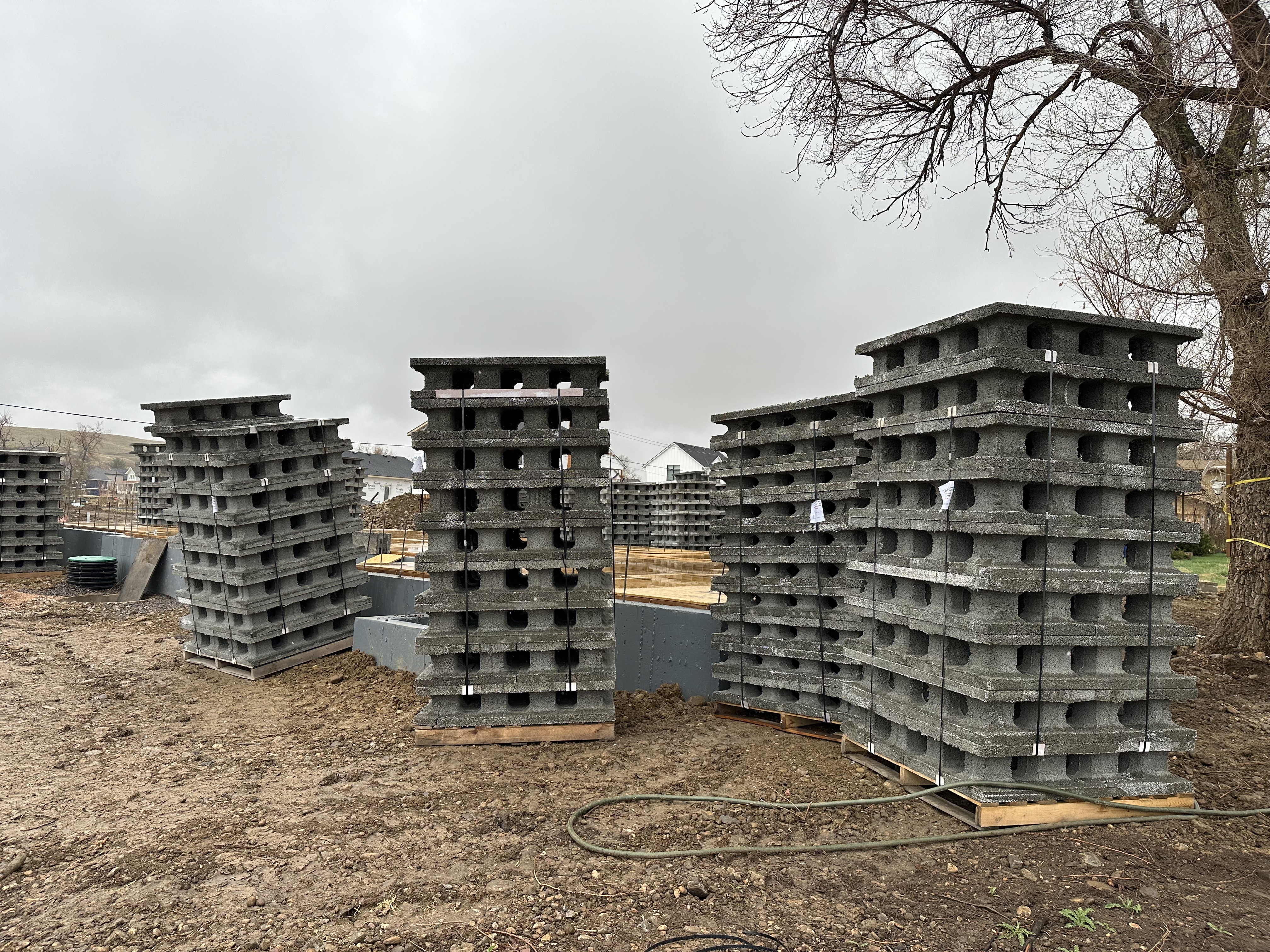 pallets of ICCF block next to the foundation
